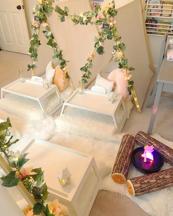 Boho teepee sleepover firepit setup by The Slumber Squad